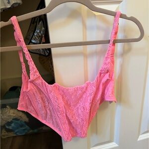 Out from under corset-hot pink and barely worn.